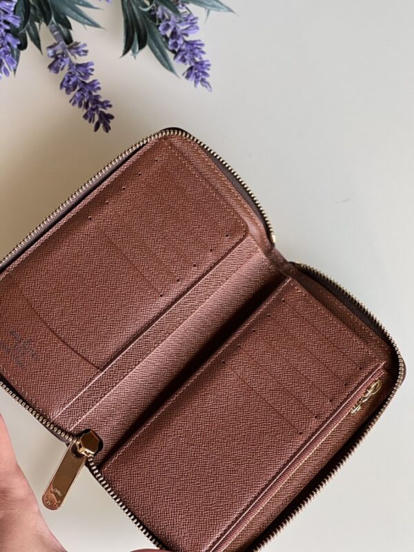 IMG_5951-1 Louis Vuitton Old Style Zippy Wallet - Image 1
