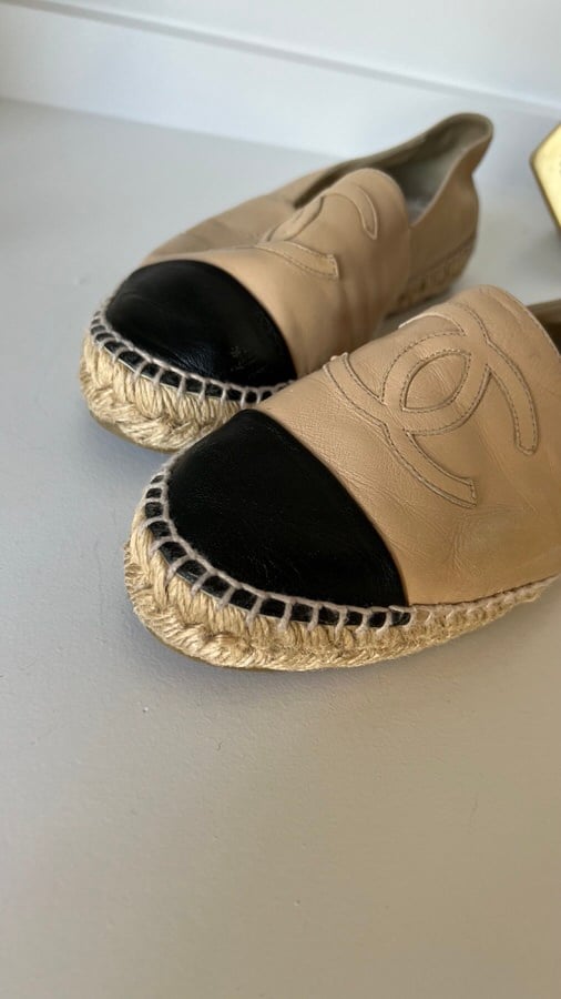 Wear points on pre-owned Chanel espadrilles.