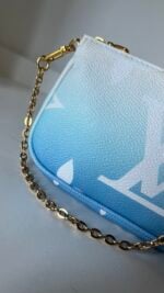 Louis Vuitton Small Pochette With Chain By The Pool - Image 3